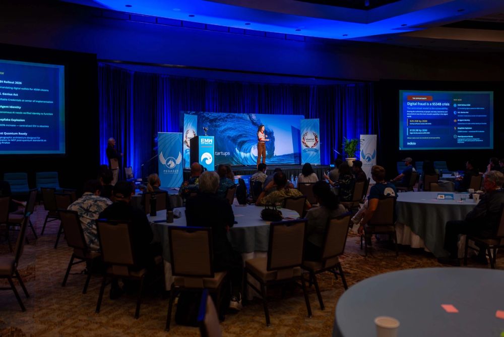A wide view of the stage and audience at East Meets West.