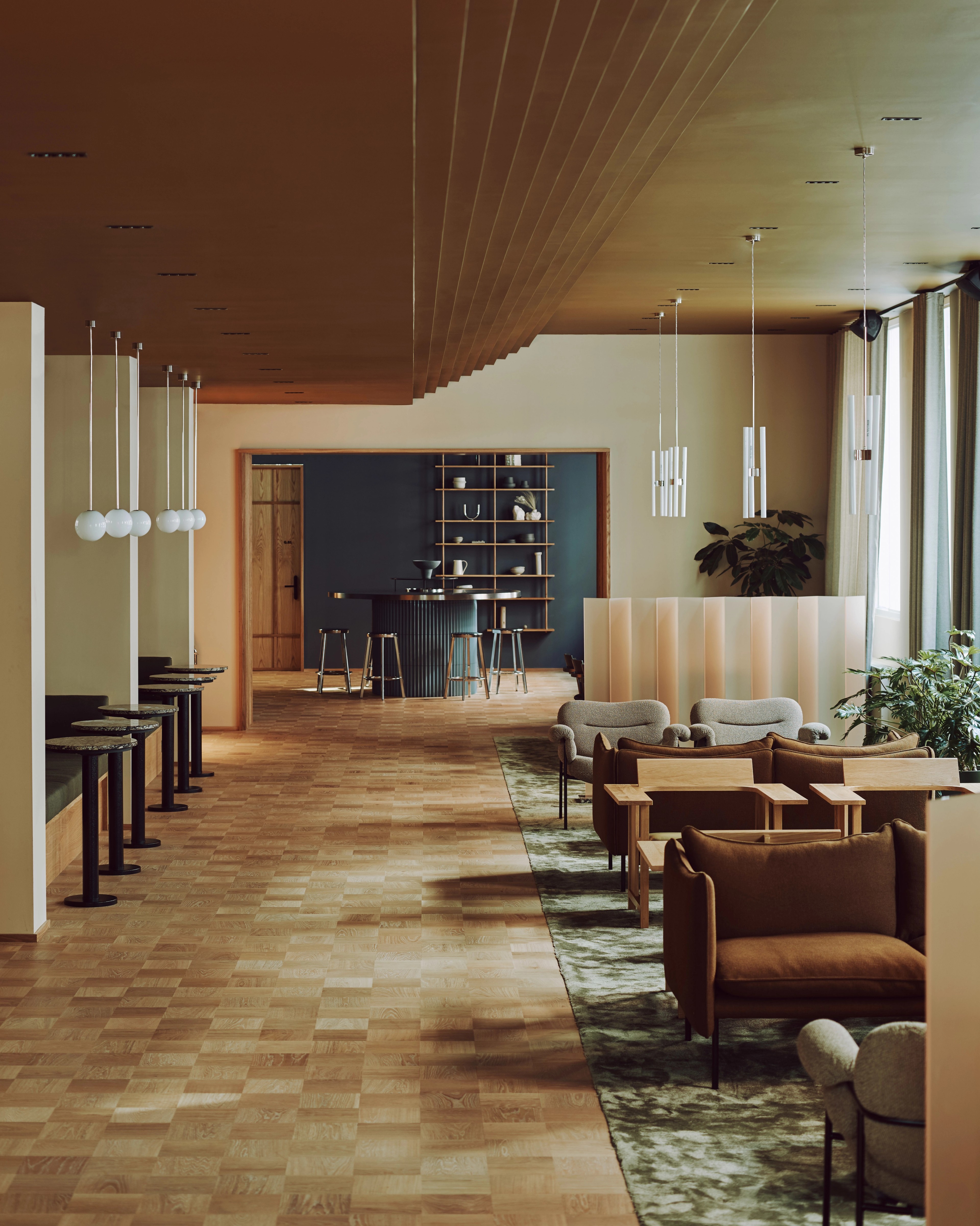 Tiki Sofa and Bollo Lounge chair in the lounge area.