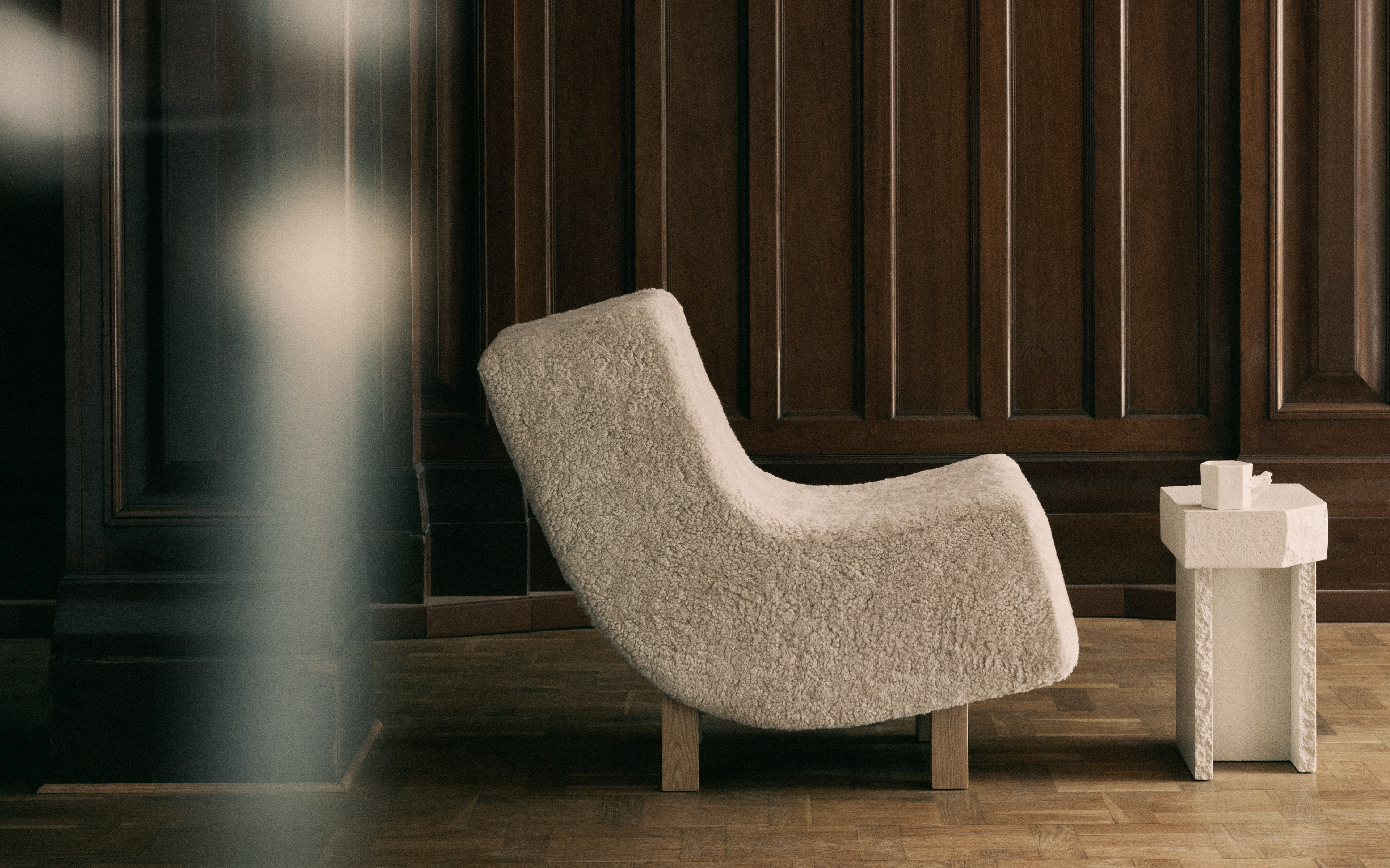 Fogia's BD1 Lounge Chair in Sheepskin mohawi and Lacquered oak.
