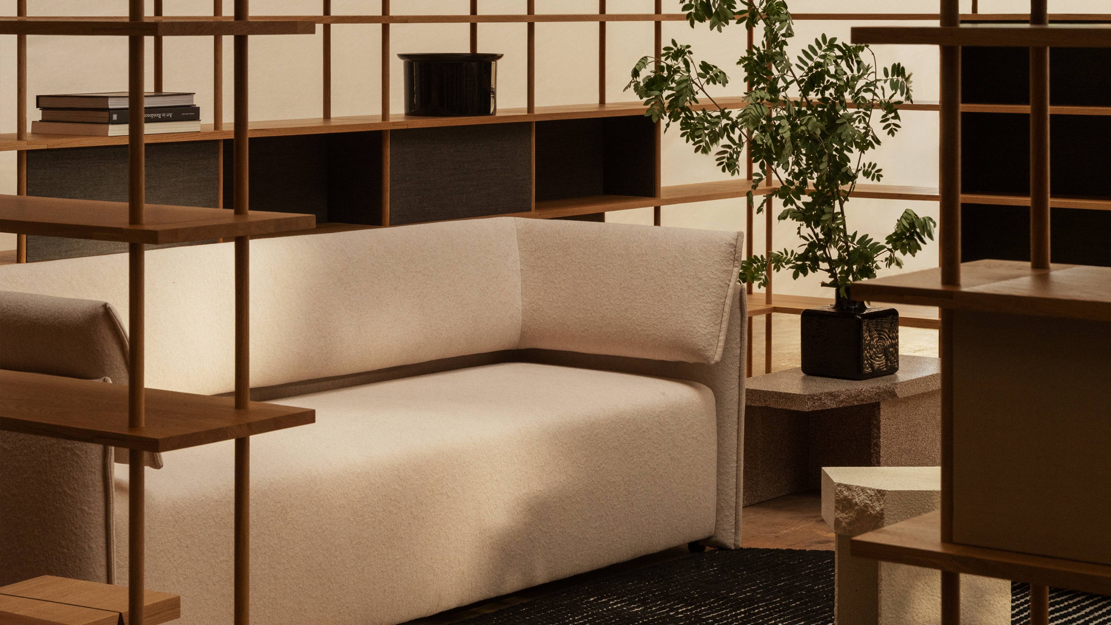 Boxlike Sofa and Kern Coffee Table and Side Table with Bond Shelf in lacquered oak.