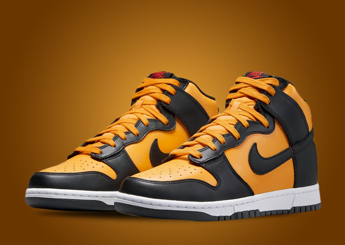 This Nike Dunk High Is Dressed In University Gold Black