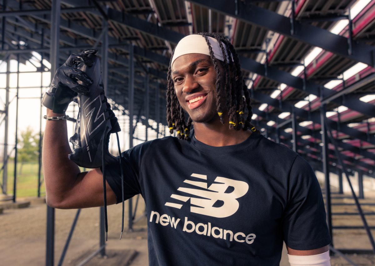 Marvin Harrison Jr. Holding New Balance's Football Cleat