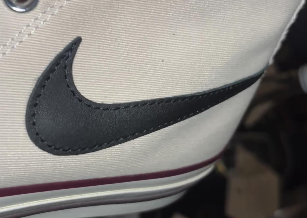 nike swoosh chuck taylor