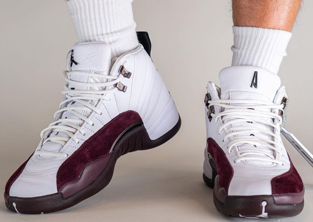 Burgundy and 2025 white jordan 12