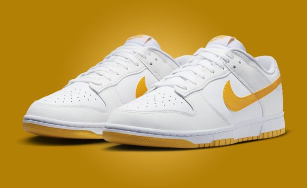 The Nike Dunk Low White University Gold Releases April 2024
