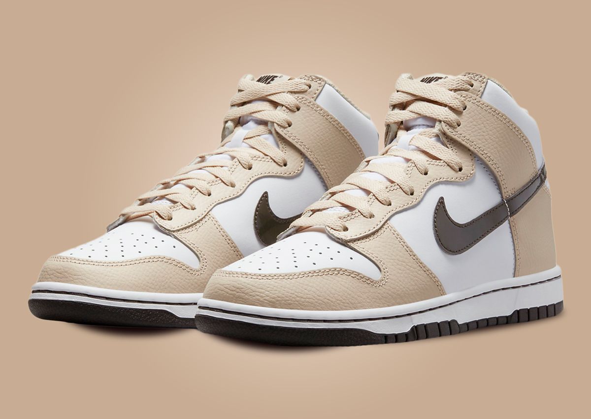 Nike's Dunk High Steps Out In A White And Beige Outfit