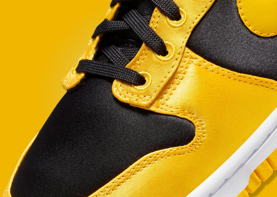 The Women's Nike Dunk High Satin Black Varsity Maize
