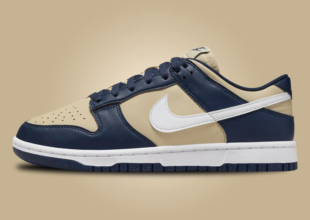 The Women S Nike Dunk Low NN Midnight Navy Team Gold Releases Spring 2024   317d2288b301fea2025056e3a95a8884c6c530db 1070x760 