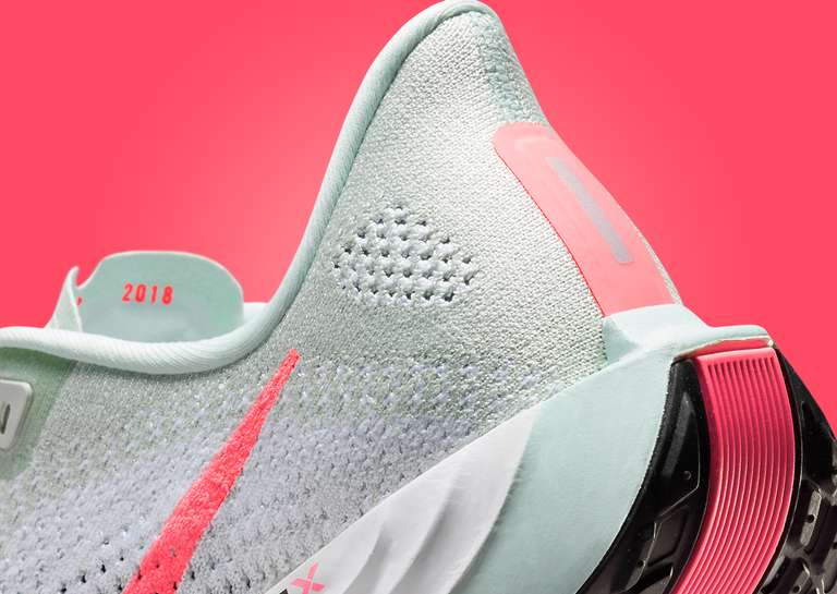 Nike Pegasus Plus Barely Grey Hot Punch Heel Detail