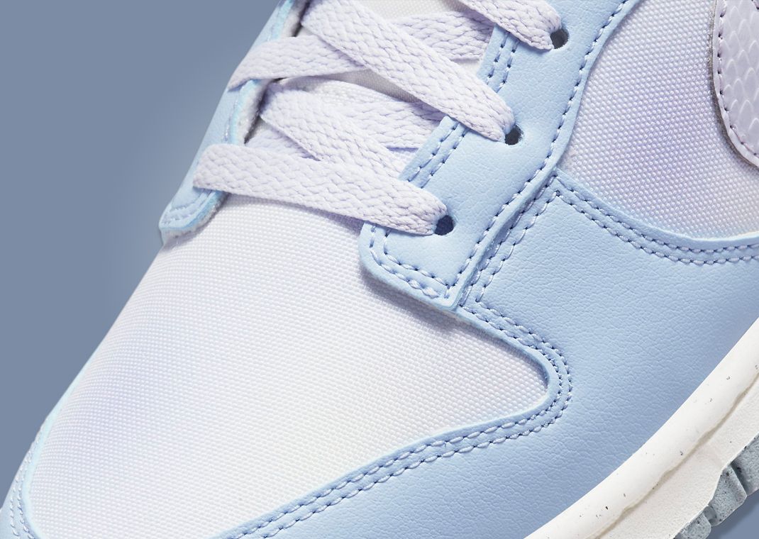 Airbrushed Purple Details Accent This Light Blue Nike Dunk Low