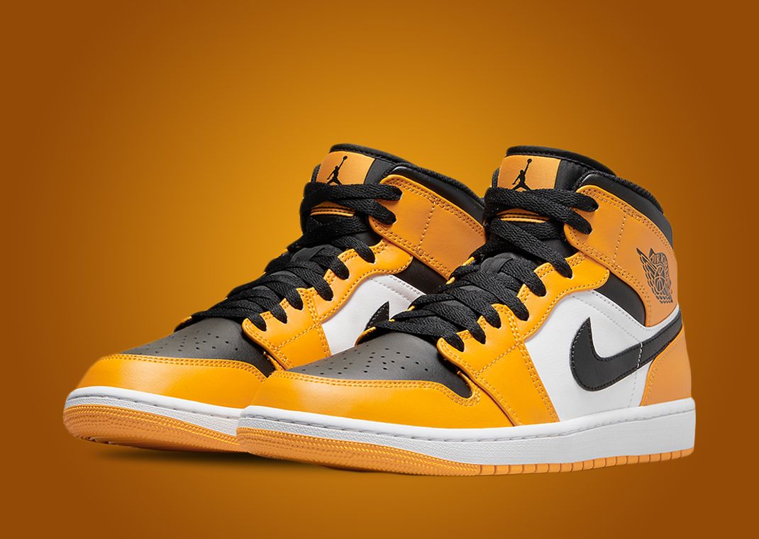 The Air Jordan 1 Mid Appears With A Yellow Toe