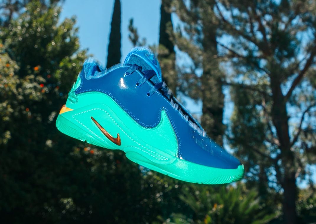 green and blue nike basketball shoes