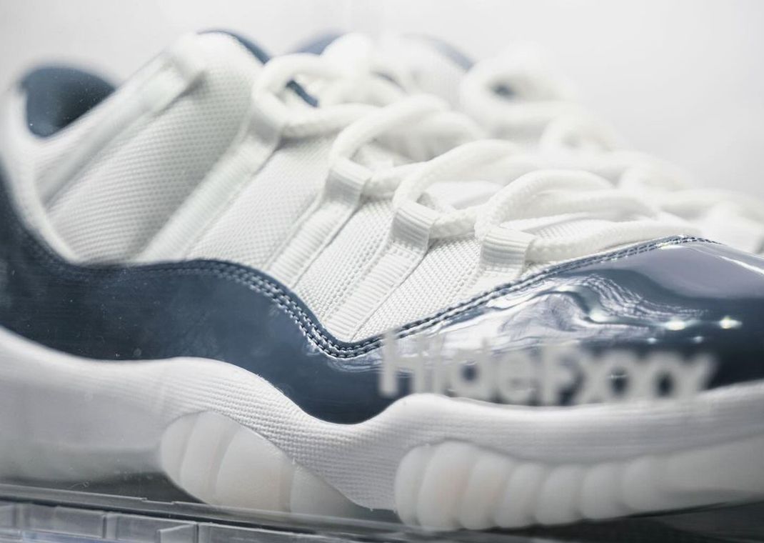 Jordan retro 11 navy best sale blue and white low