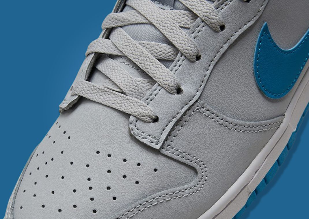 This Nike Dunk Low Comes Accented With Light Blue Shades