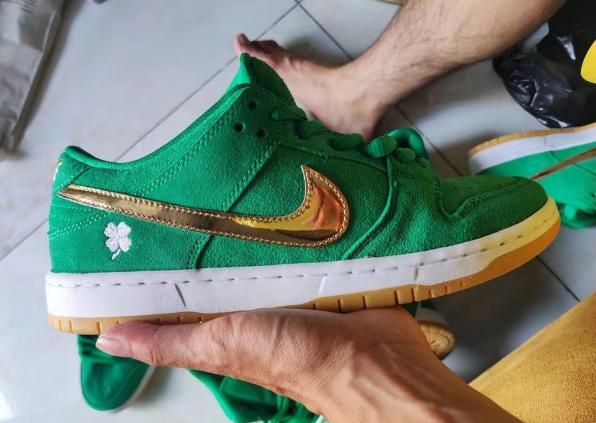 In hand image of the Nike SB Dunk Low St. Patrick's Day