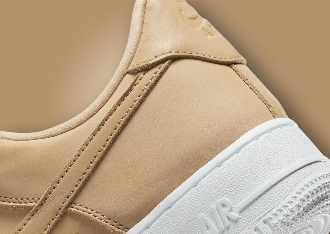 Premium Vachetta Tan Leather Drapes Over This Nike Air Force 1 Low