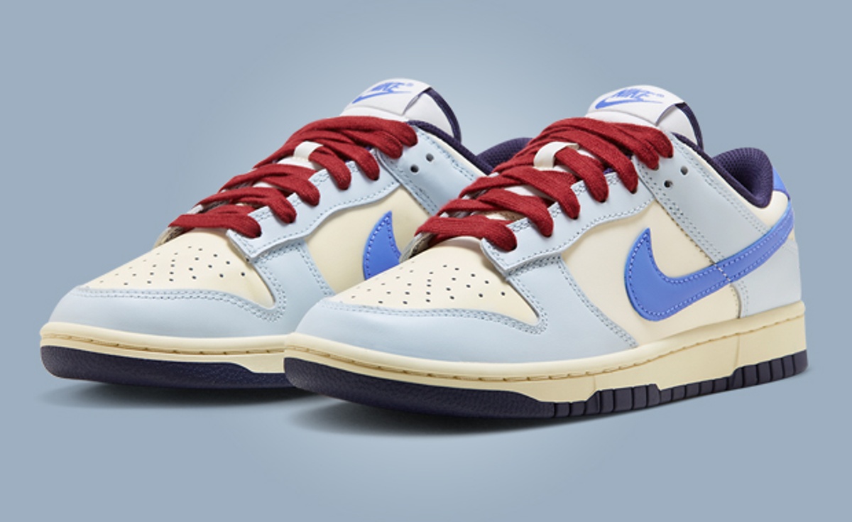 Airbrushed Purple Details Accent This Light Blue Nike Dunk Low