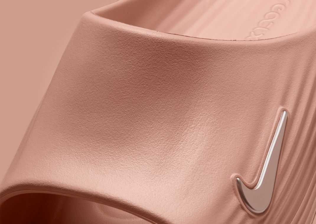 The Women's Nike ReactX Rejuven8 Slide Rose Gold Releases