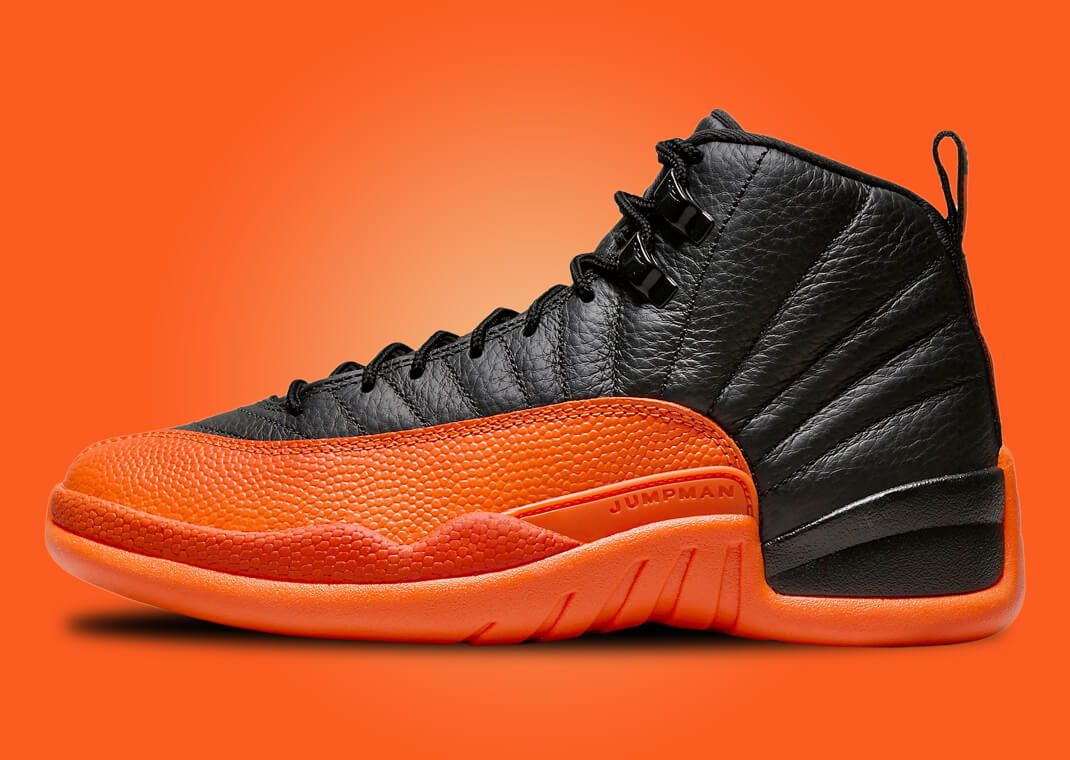 Orange and hot sale black 12s jordans