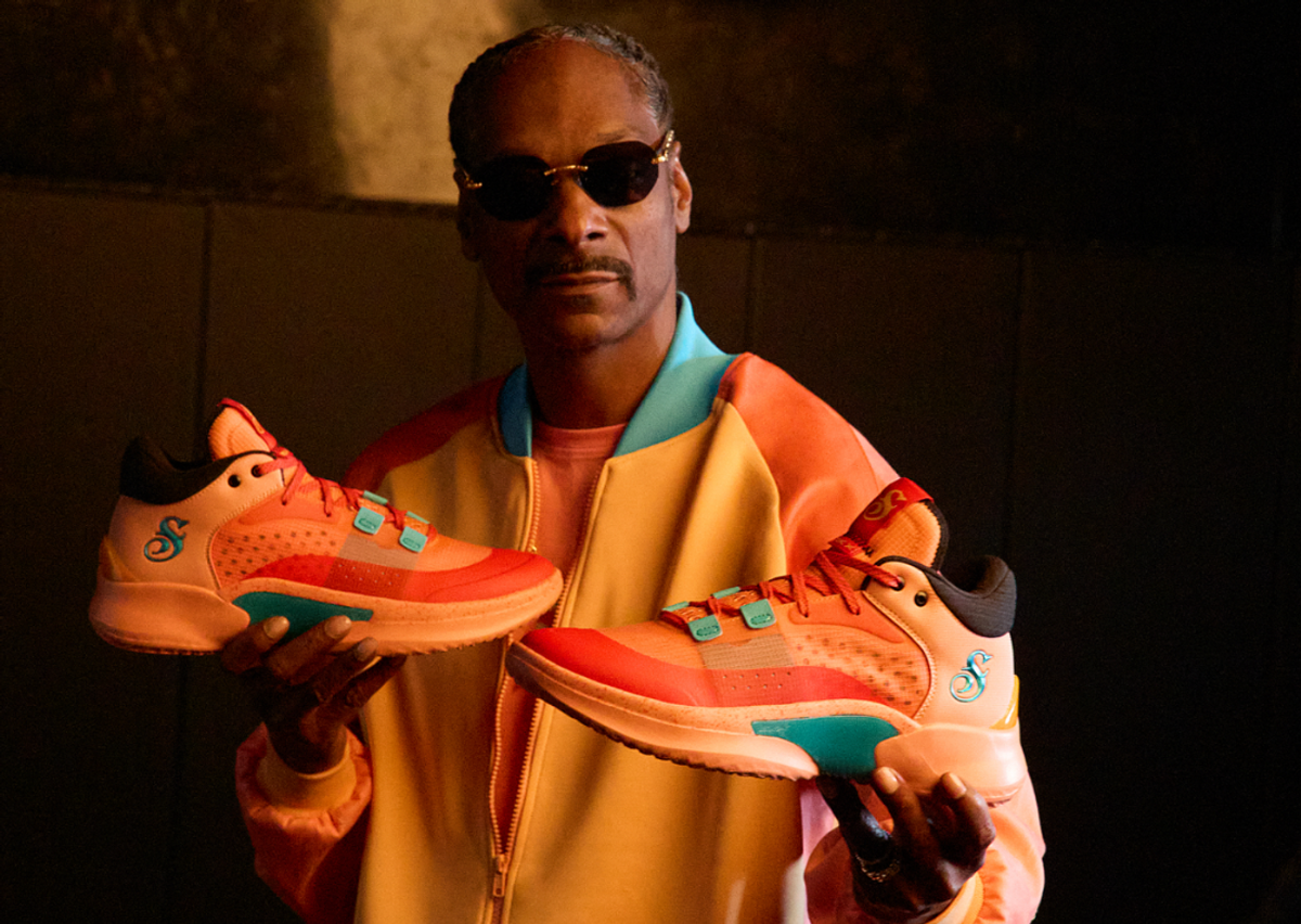 Snoop Dogg Holding His Skechers SKX Resagrip
