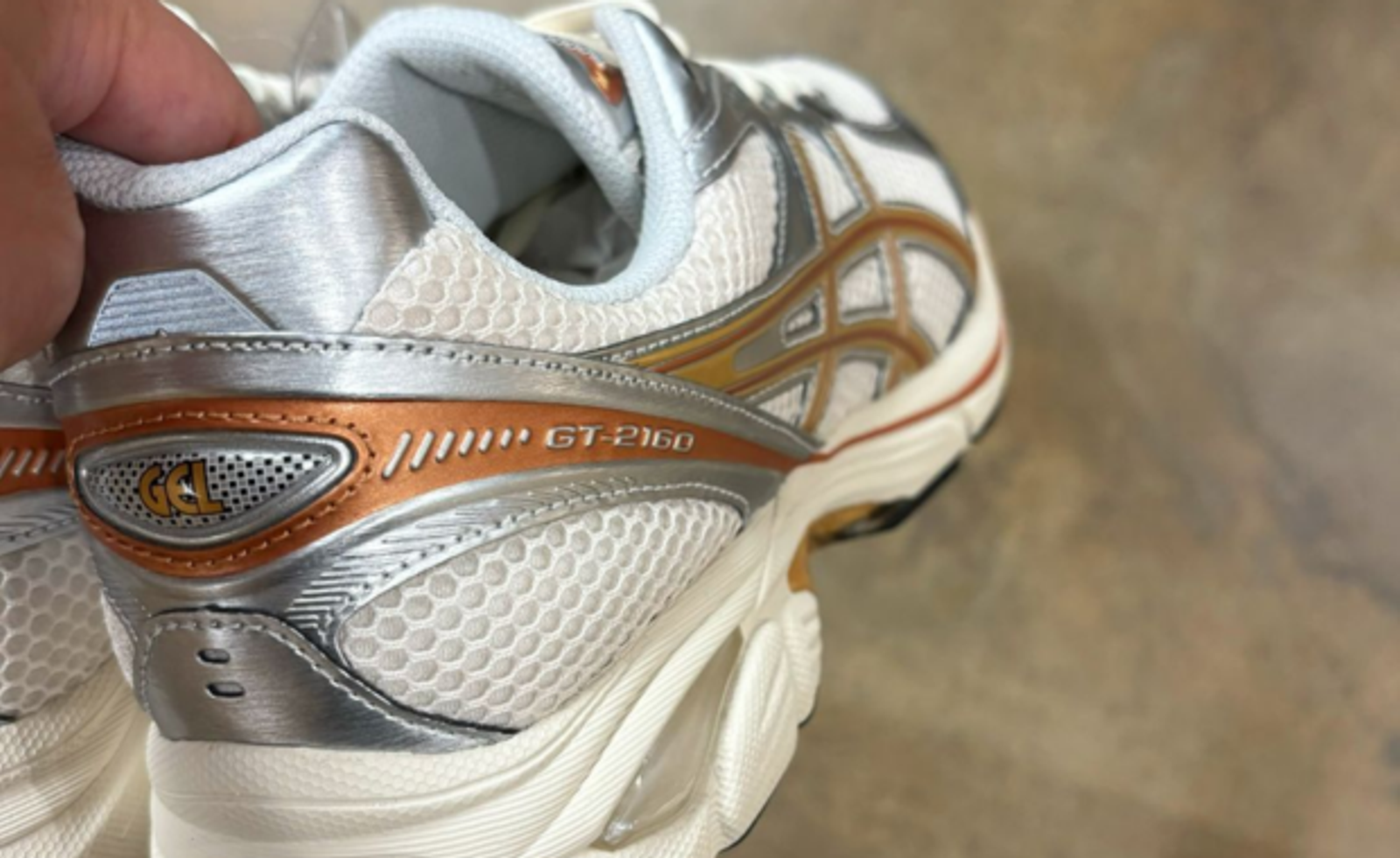 The atmos x Asics GT-2160 Cream Silver Orange Releases July 2024