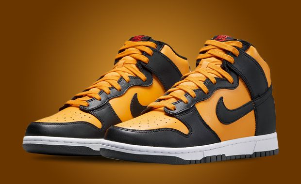 This Nike Dunk High Is Dressed In University Gold Black