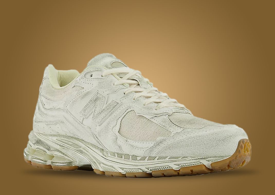 The New Balance 2002R Protection Pack Continues In Worn White