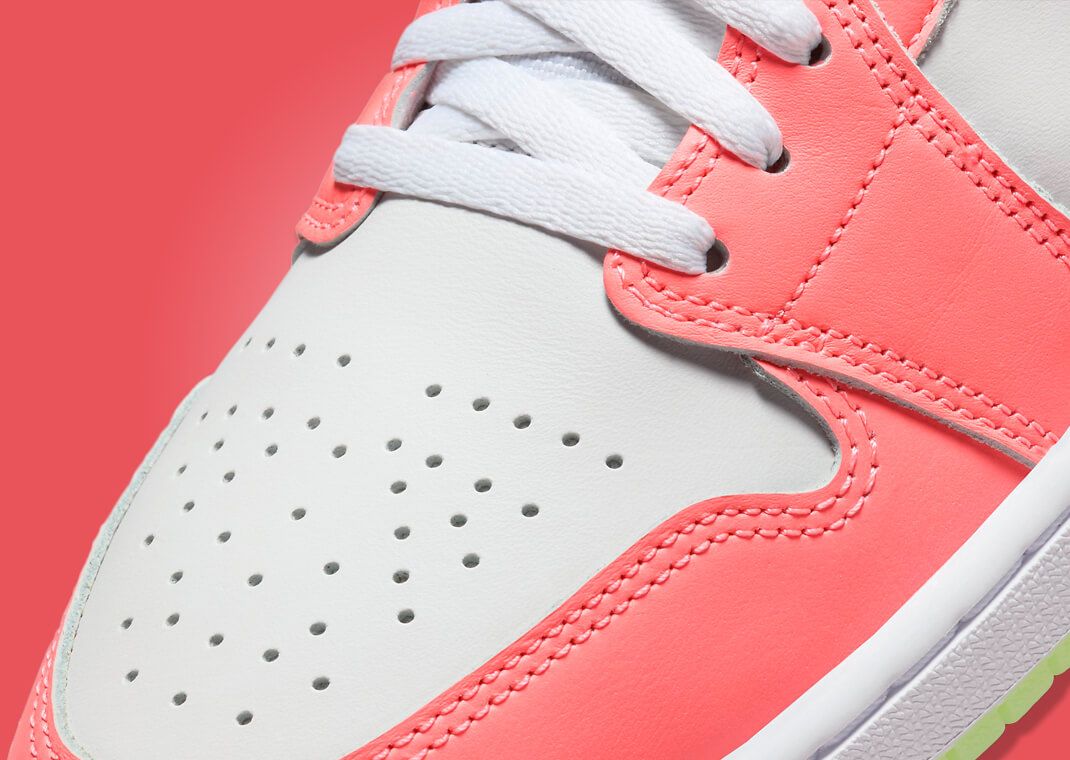 The Air Jordan 1 Low Lava Glow and Barely Volt Channels Pink  display picture 1