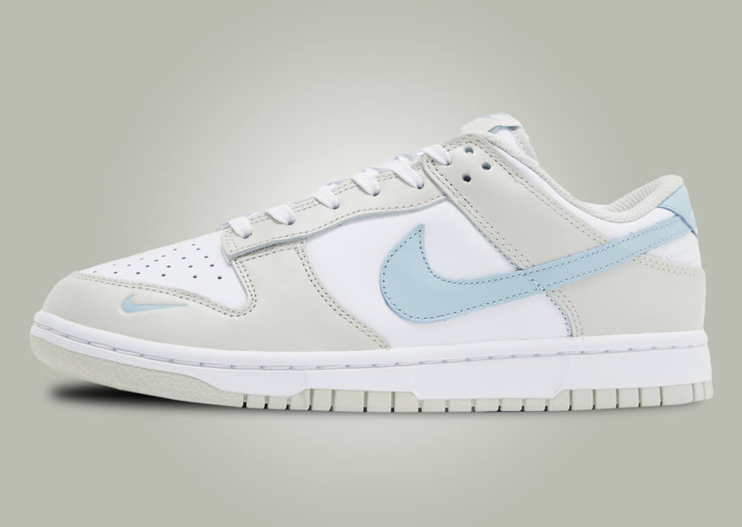 The Women S Nike Dunk Low Light Bone Light Armory Blue Releases Spring 2024   767e6aa244e9cf9f000c0c08e7ff80c6879535f9 1070x760 