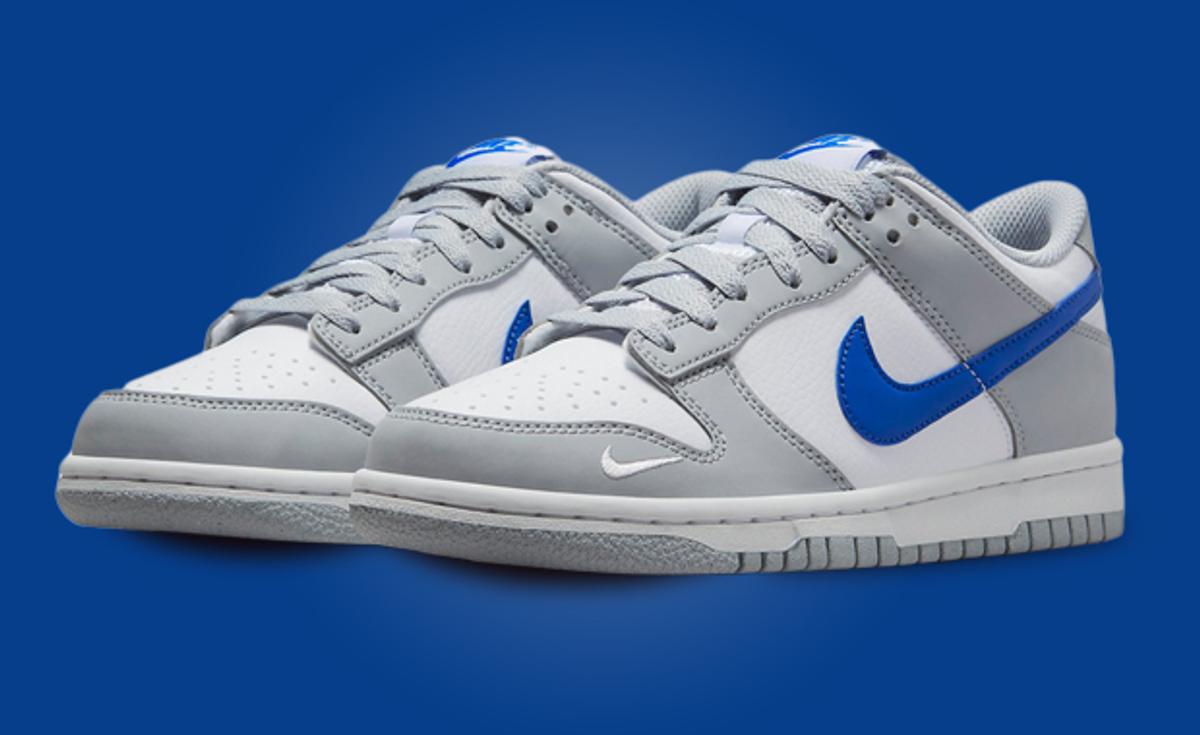 This Nike Dunk Low Features Mini Swoosh Details And A Wolf Grey Color Scheme