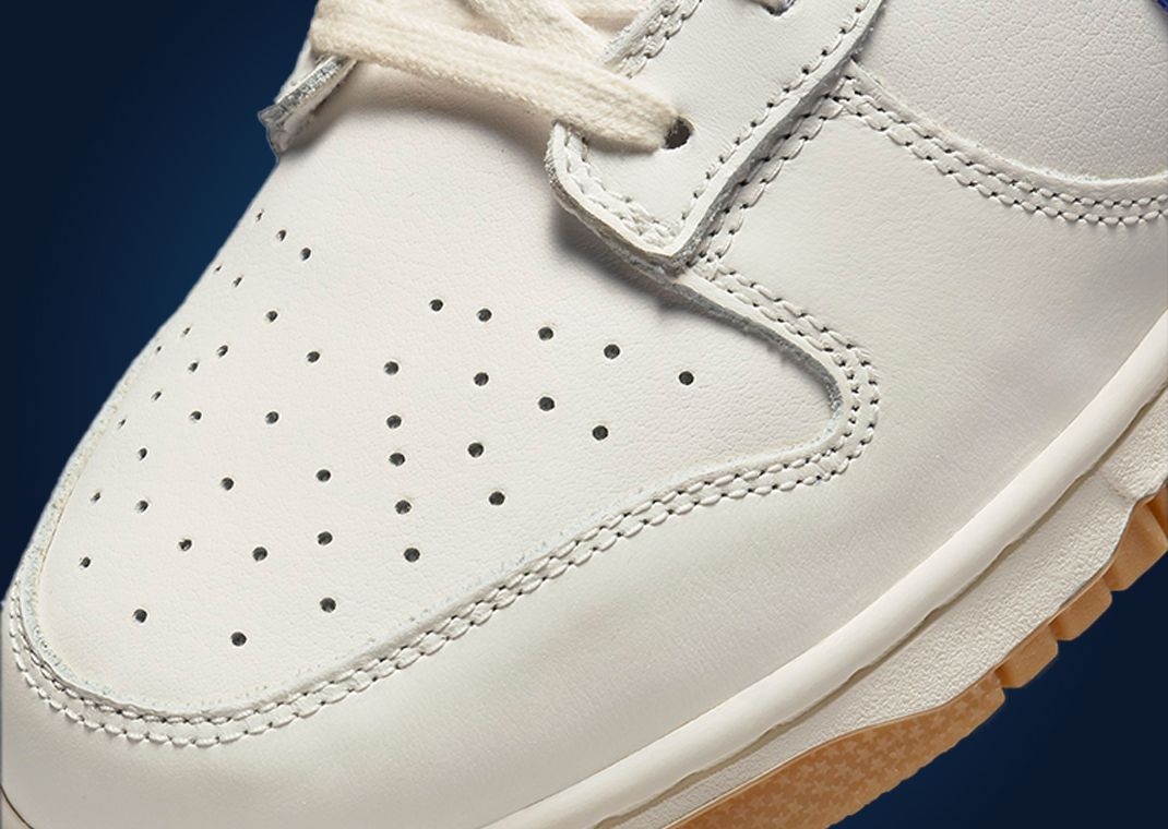 Gum Bottoms Finish Off The Nike Dunk Low Sail Blue