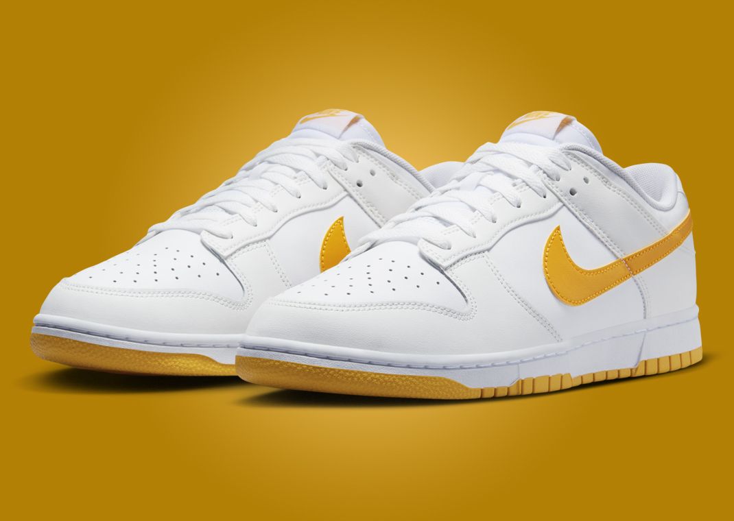 The Nike Dunk Low White University Gold Releases April 2024