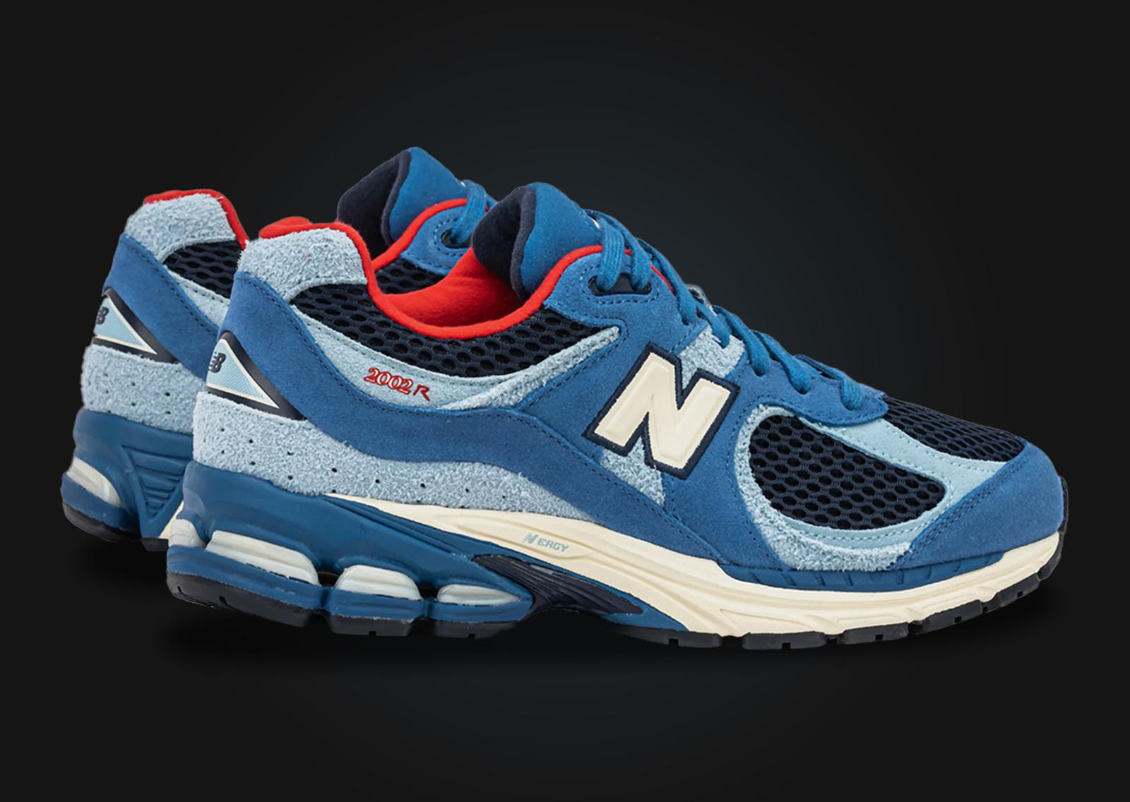 Shoe Palace x New Balance 2002R Volcanic Blue Red Heel Angle