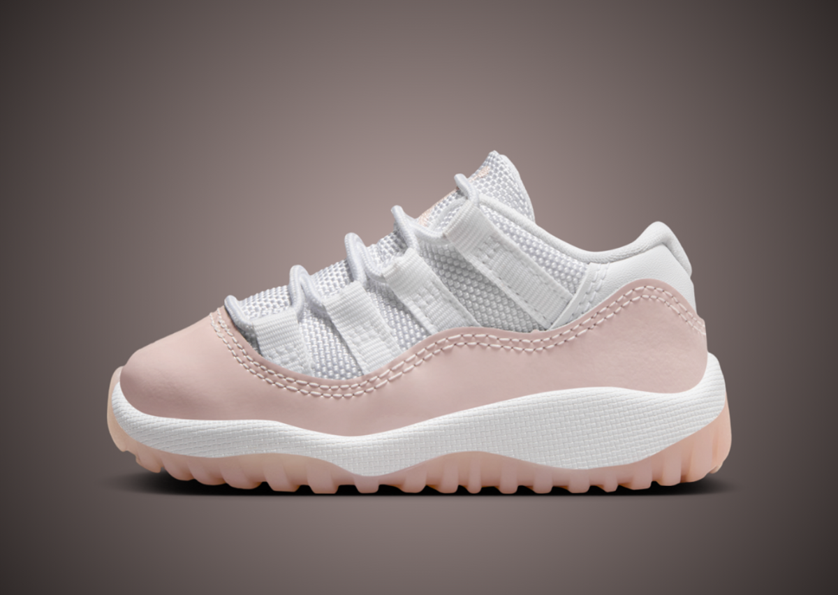 Pink and white sales low top 11s