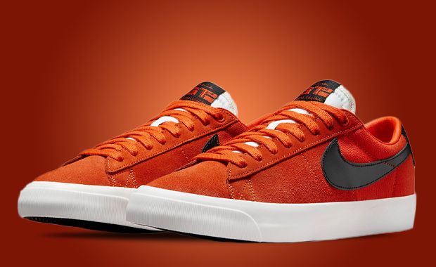 Tênis nike sb blazer low gt supreme top laranja