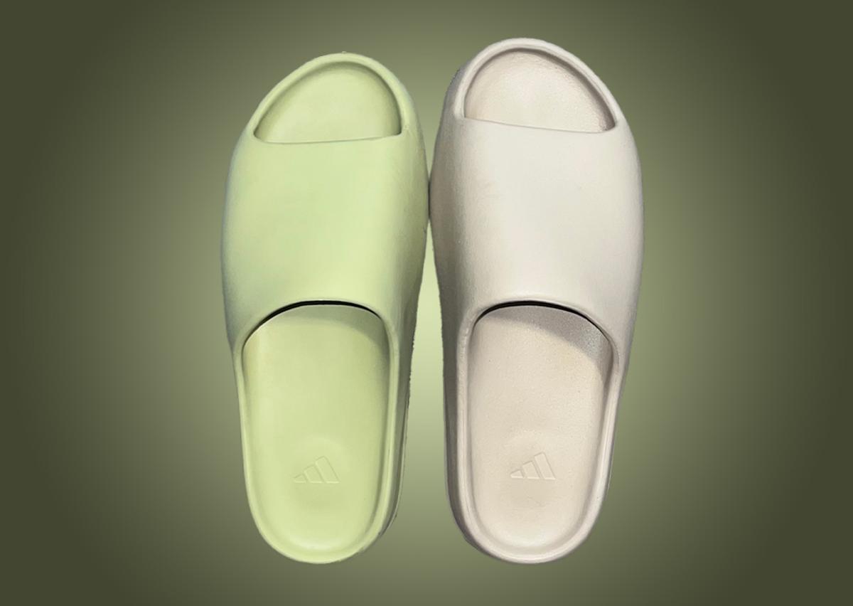 Two Size 14 adidas Yeezy Slides With The Original Release "Resin" (Left) Compared To The New Released "Pure"