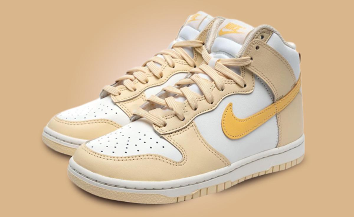 This Women’s Exclusive Nike Dunk High Comes In Pale Vanilla Topaz Gold