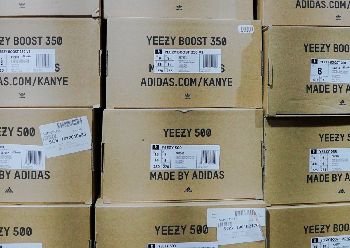 Yeezy Boxes Piled Up (Image via Alex Haney | Unsplash)