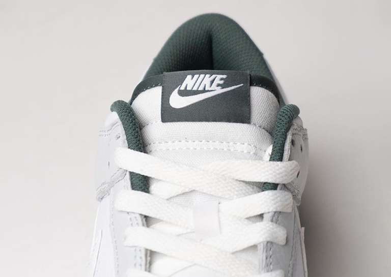 Nike Dunk Low Photon Dust Vintage Green Tongue Tag Front