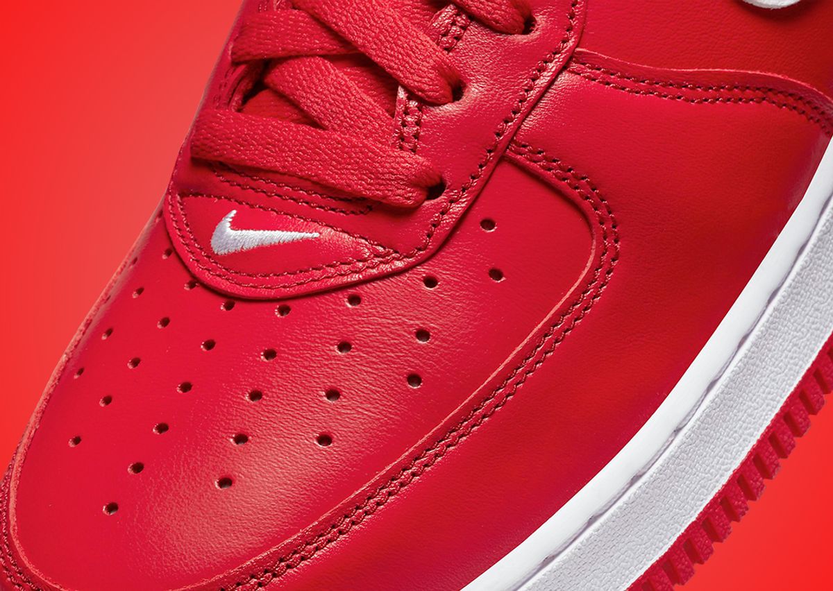University Red Engulfs The Nike Air Force 1 High •