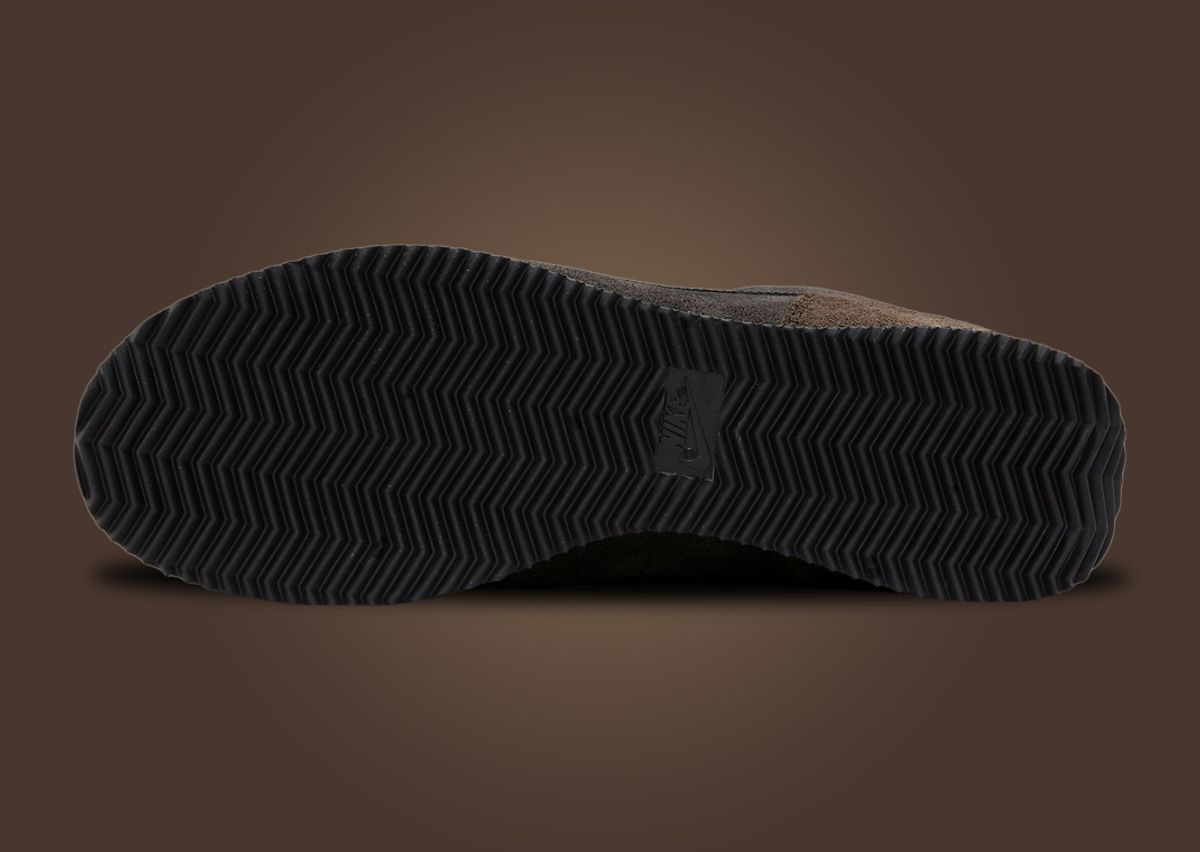 Supple Velvet Brown Suede Drapes Over The Nike Cortez