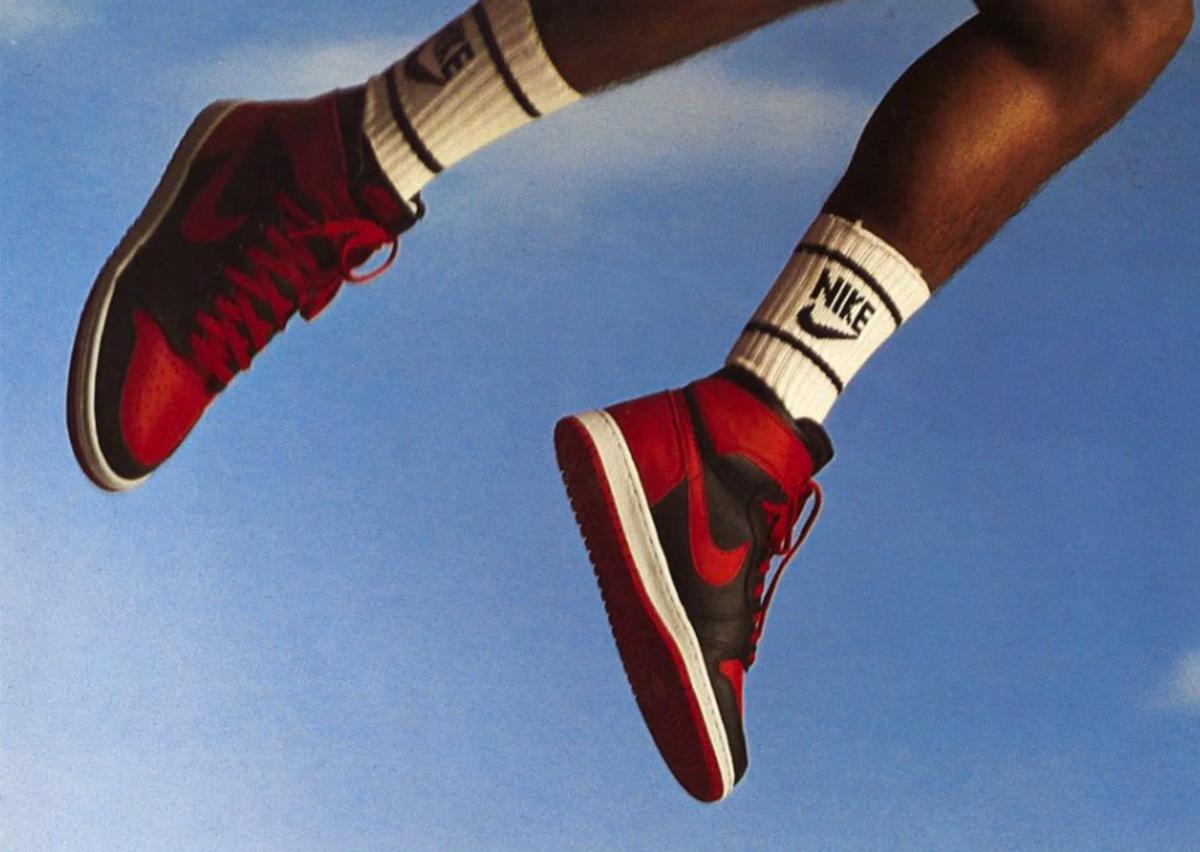 Michael Jordan wearing the Air Jordan 1 High Bred