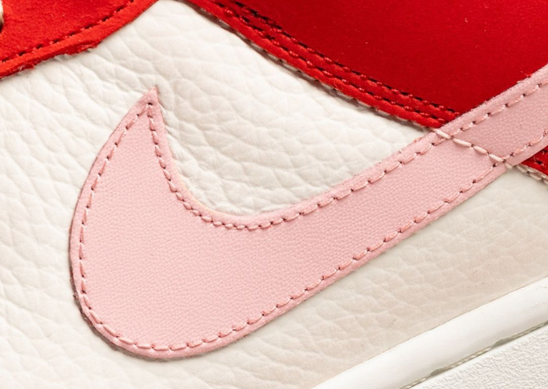Up close Nike Dunk Low Bacon (W) Pink Nike Check