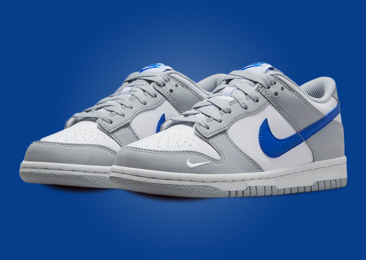 This Nike Dunk Low Features Mini Swoosh Details And A Wolf Grey Color Scheme