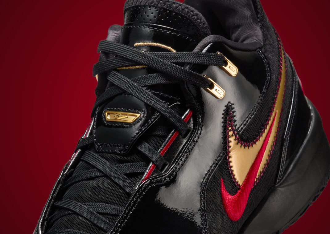The Nike LeBron NXXT Gen Ampd Black Metallic Gold University Red