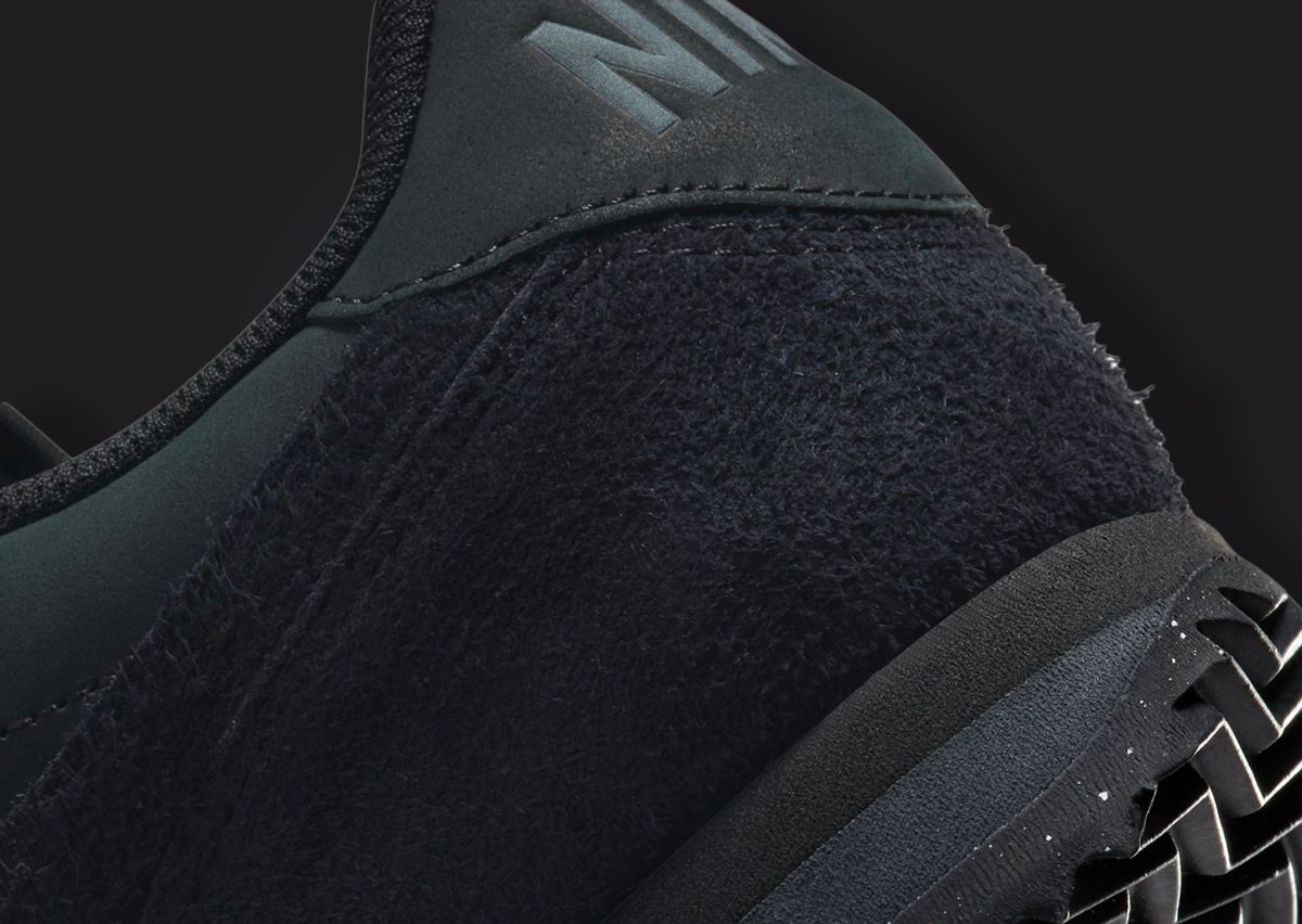 triple black nike cortez