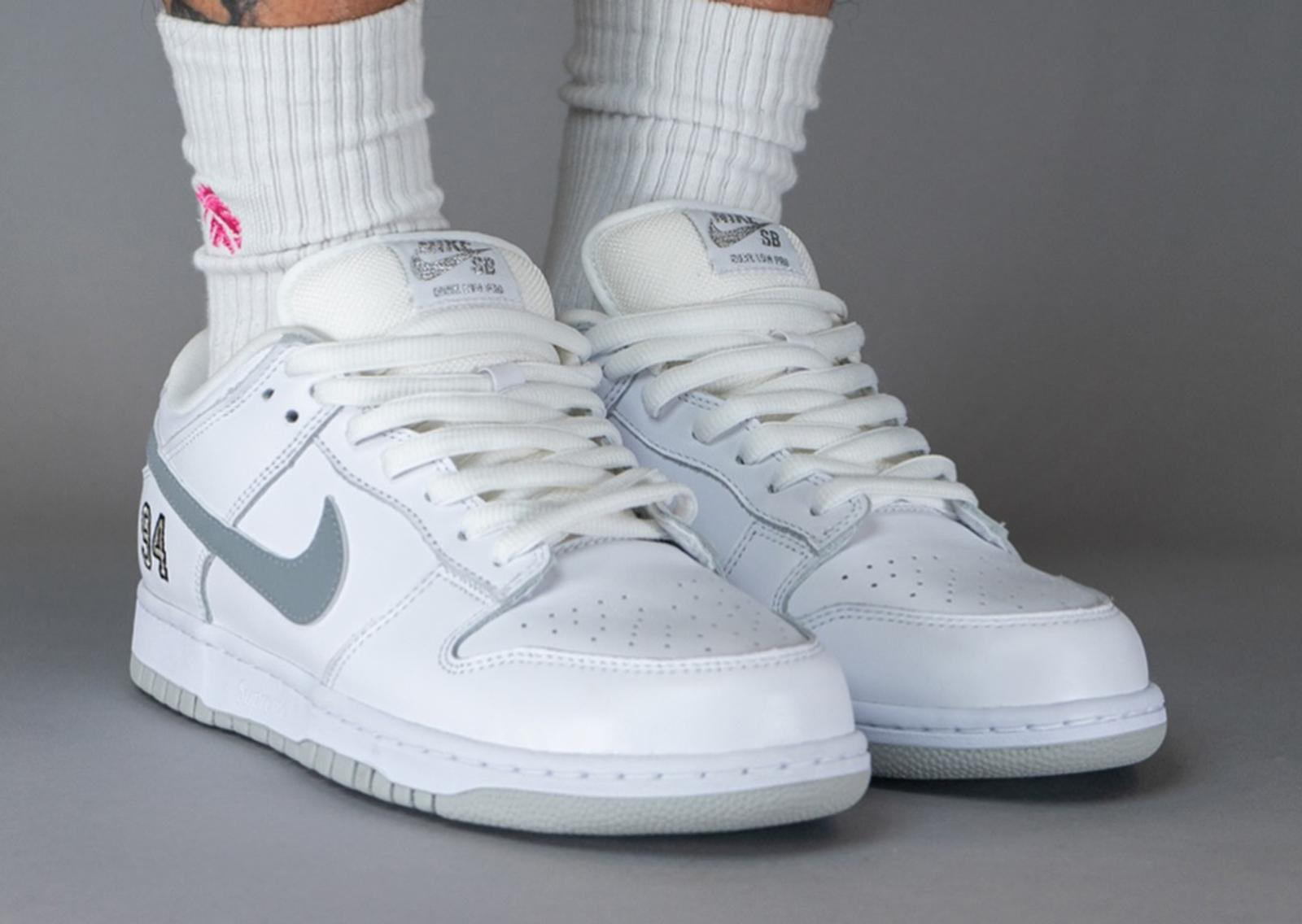 Supreme x Nike SB Dunk Low White Metallic Silver Angle Right