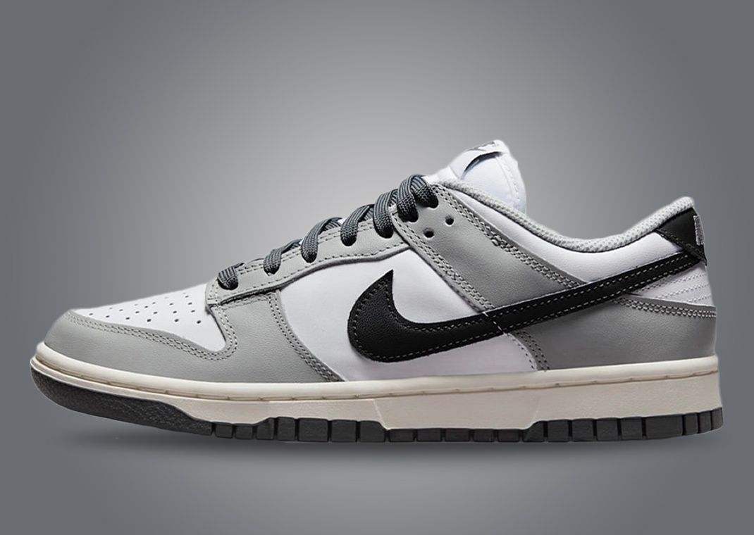 This Nike Dunk Low Comes In White And Light Smoke Grey