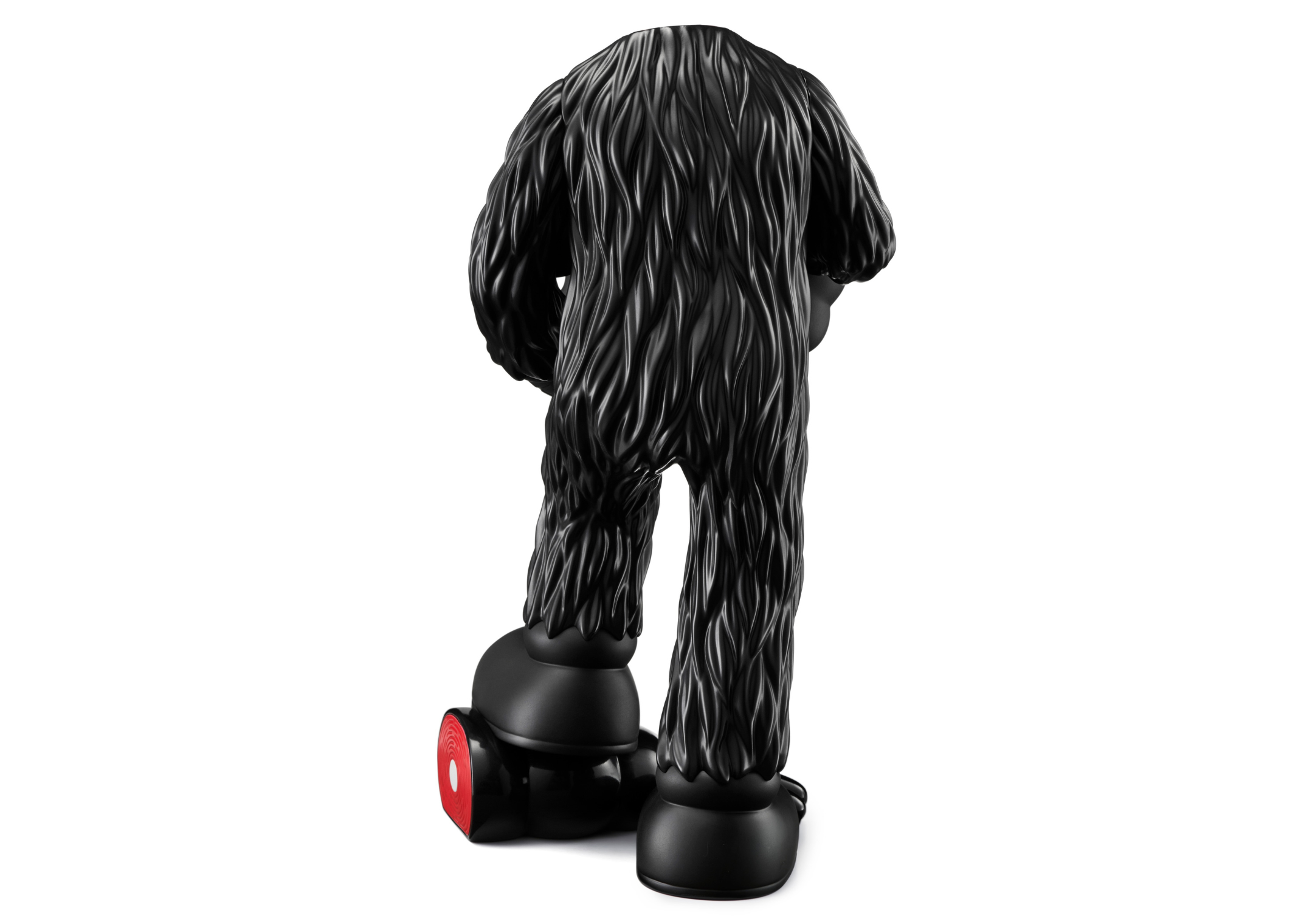 KAWS is Dropping a Headless FELLOWS Vinyl Figure