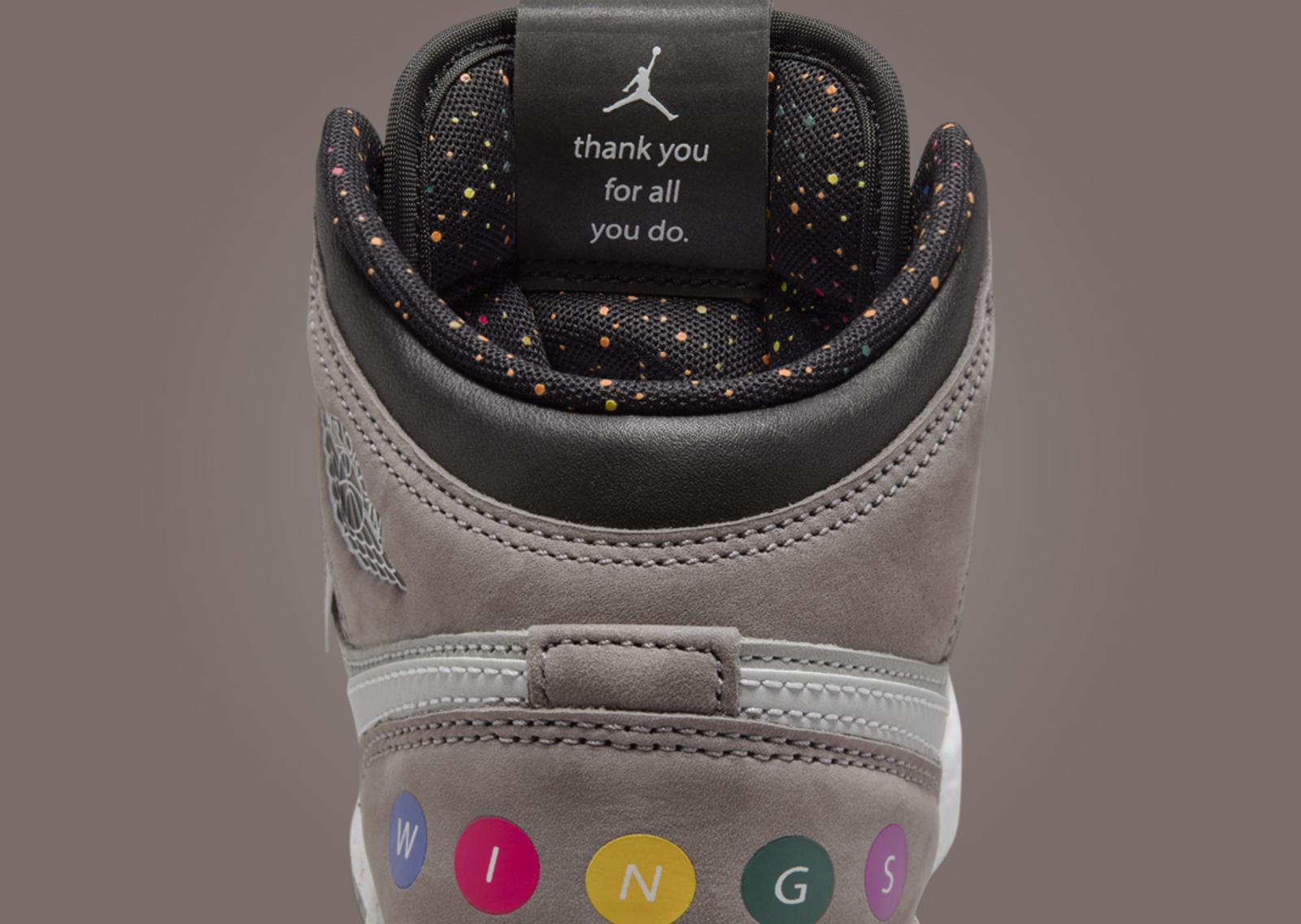 Air Jordan 1 Mid Wings NYC (GS) Tongue Tag Detail